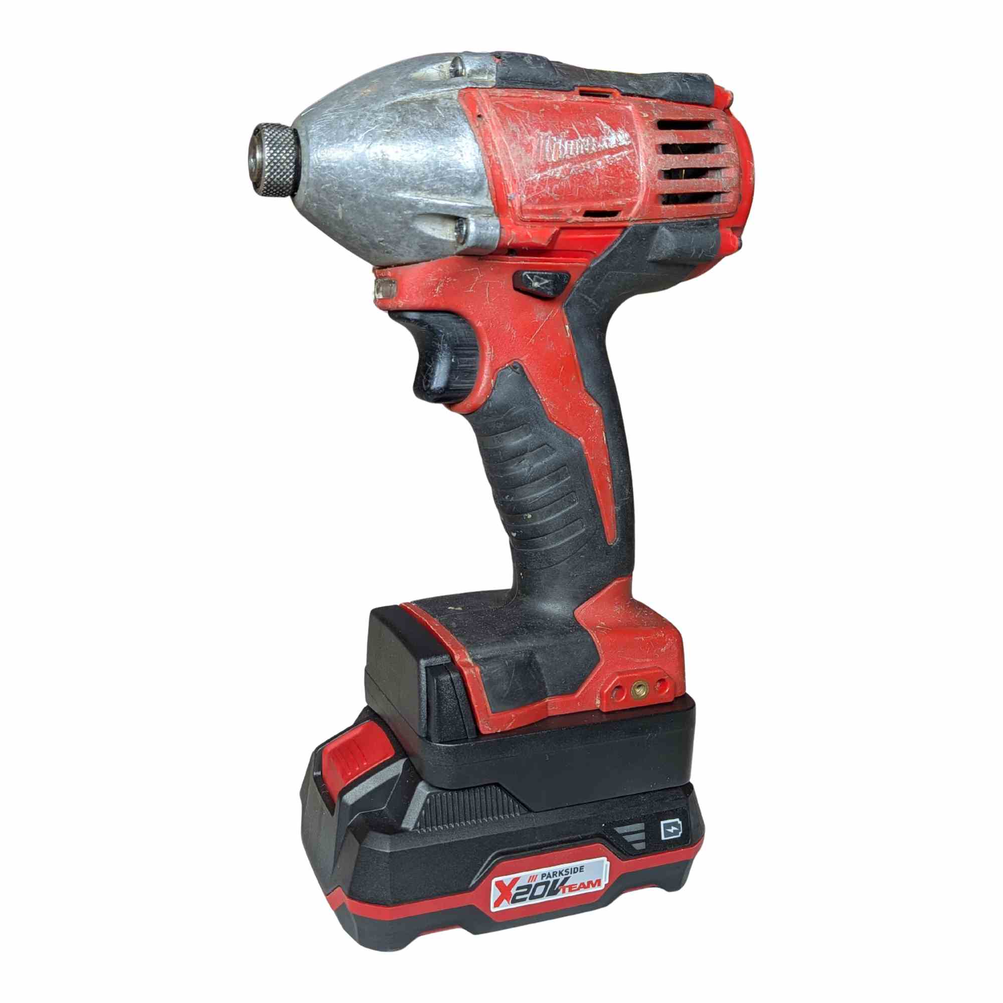 Parkside X20V to Milwaukee M18 battery adapter - installed on an impact driver with the battery pack fitted below - side view