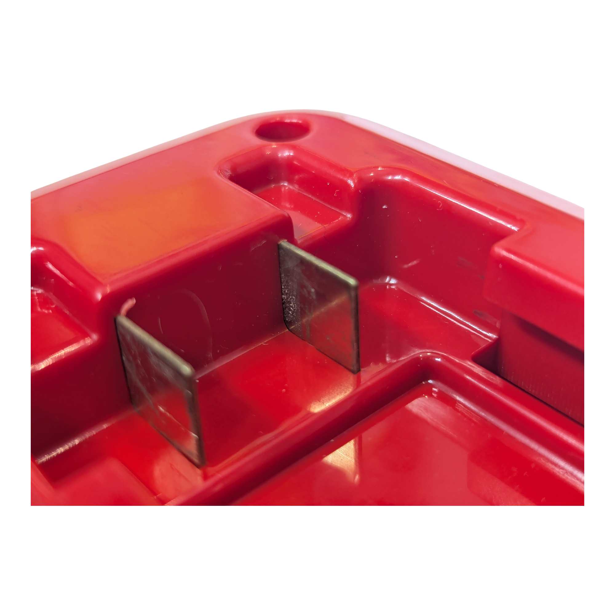 Porter Cable 20V to Milwaukee M18 battery adapter - close-up of the battery-side socket with twin copper blade contacts