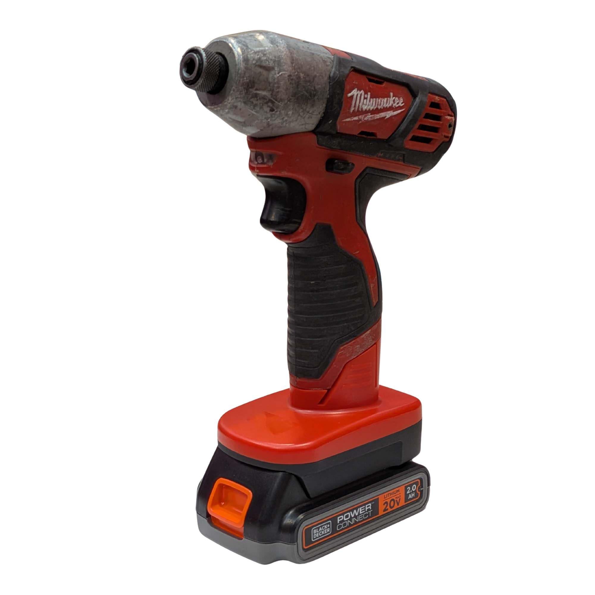 Black and Decker 20V to Milwaukee M12 battery adapter - installed on an impact driver, seated on the battery pack