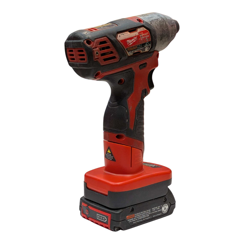 Bosch 18V GBA (Blue) to Milwaukee M12 battery adapter - installed on an impact driver with the battery pack fitted below -