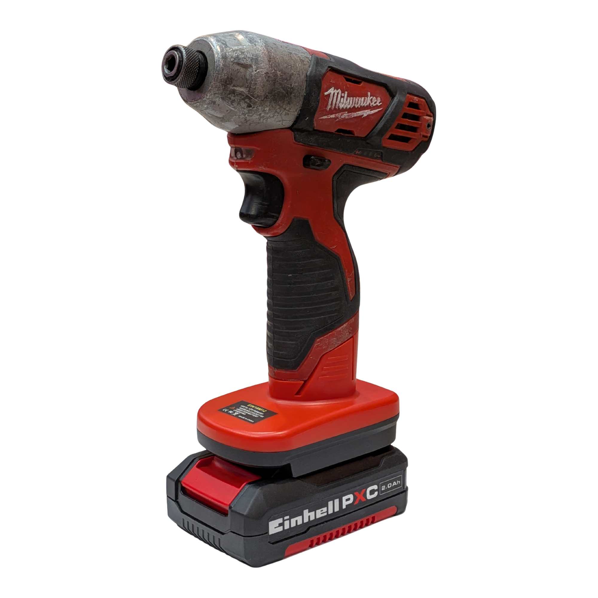Einhell 18V PXC to Milwaukee M12 battery adapter - installed on an impact driver, seated on the battery pack
