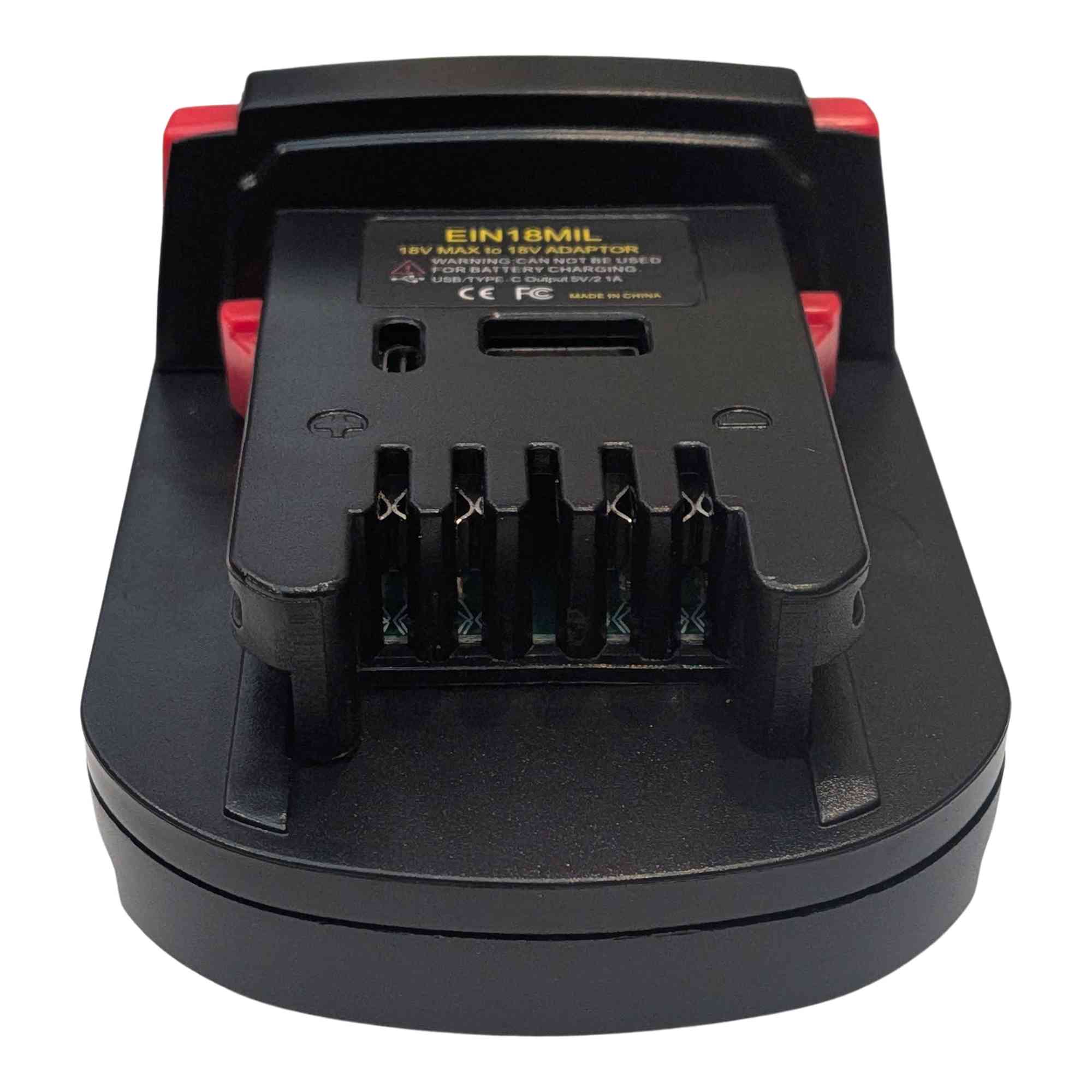 Einhell 18V PXC to Milwaukee M18 battery adapter - Milwaukee tool-side connection with four contact slots and polarity marks