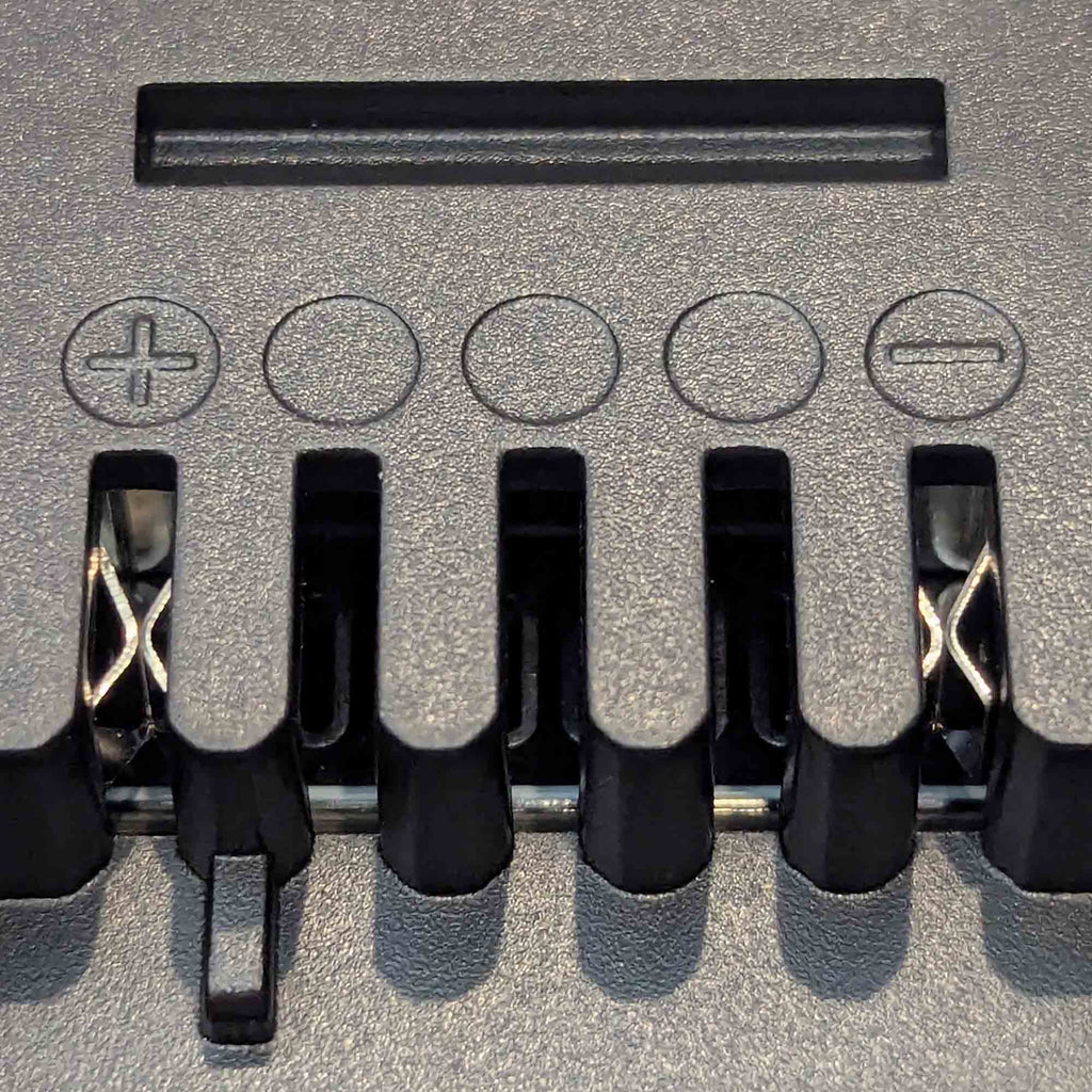 Makita 18V LXT to Einhell 18V PXC battery adapter - Einhell tool-side terminal slots with plus and minus marks
